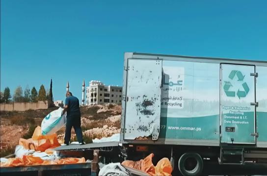 Ommar El Ard Recycling collection vehicle